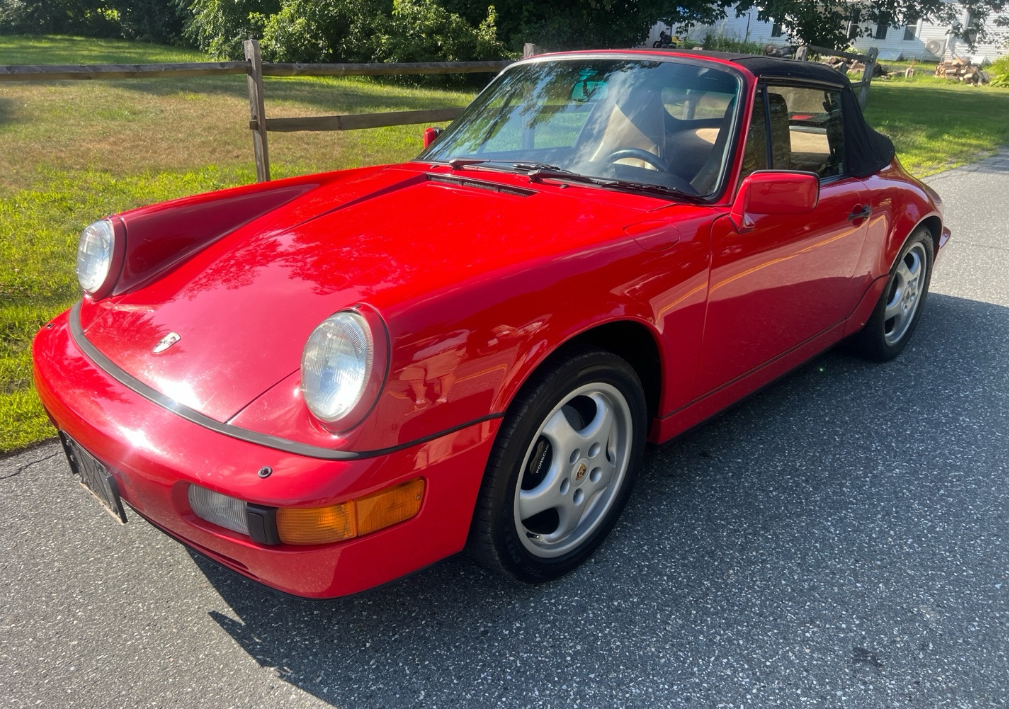 Red Porsche 964 911 Carrera cabriolet transported by Allstar Hauling