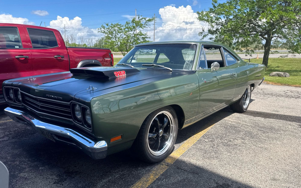 Green 1969 Plymouth Road Runner 383 hauled by Allstar Hauling