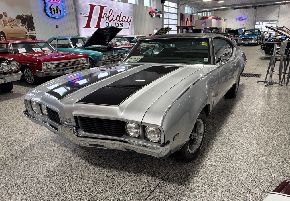 Silver 1969 Oldsmobile 442 muscle car hauled by Allstar Hauling